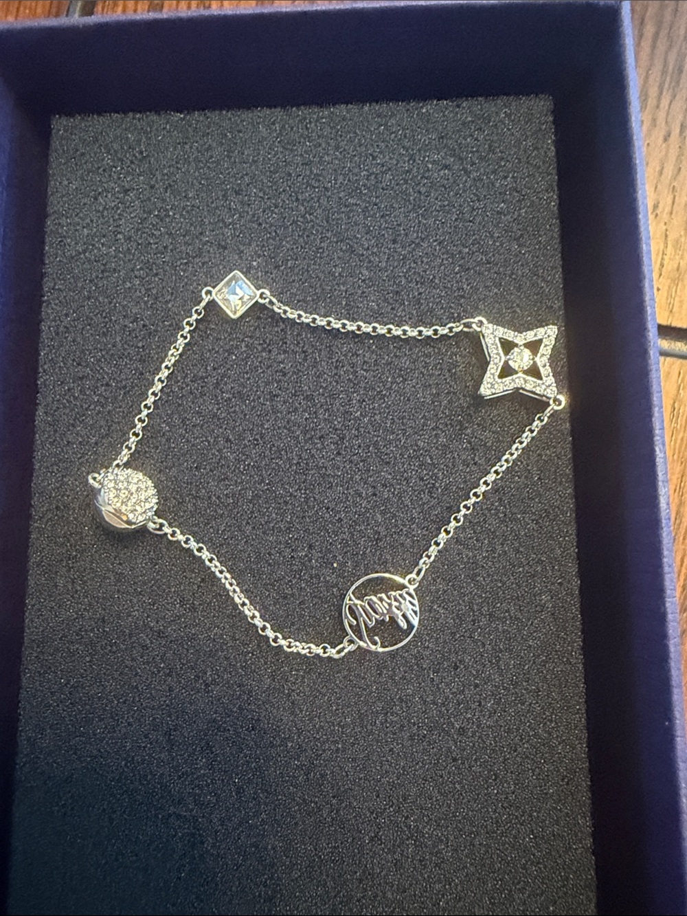 Swarovski Silver-Tone Multi-Charm Bracelet with Crystal Accents